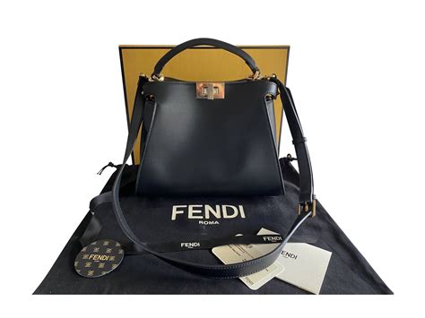 wie erkenne ich eine echte fendi handtasche|are fendi purses real.